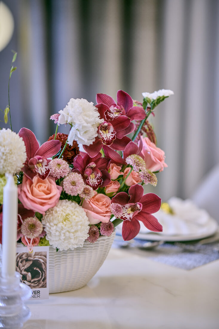 Celebration flower arrangement by Flower Corner